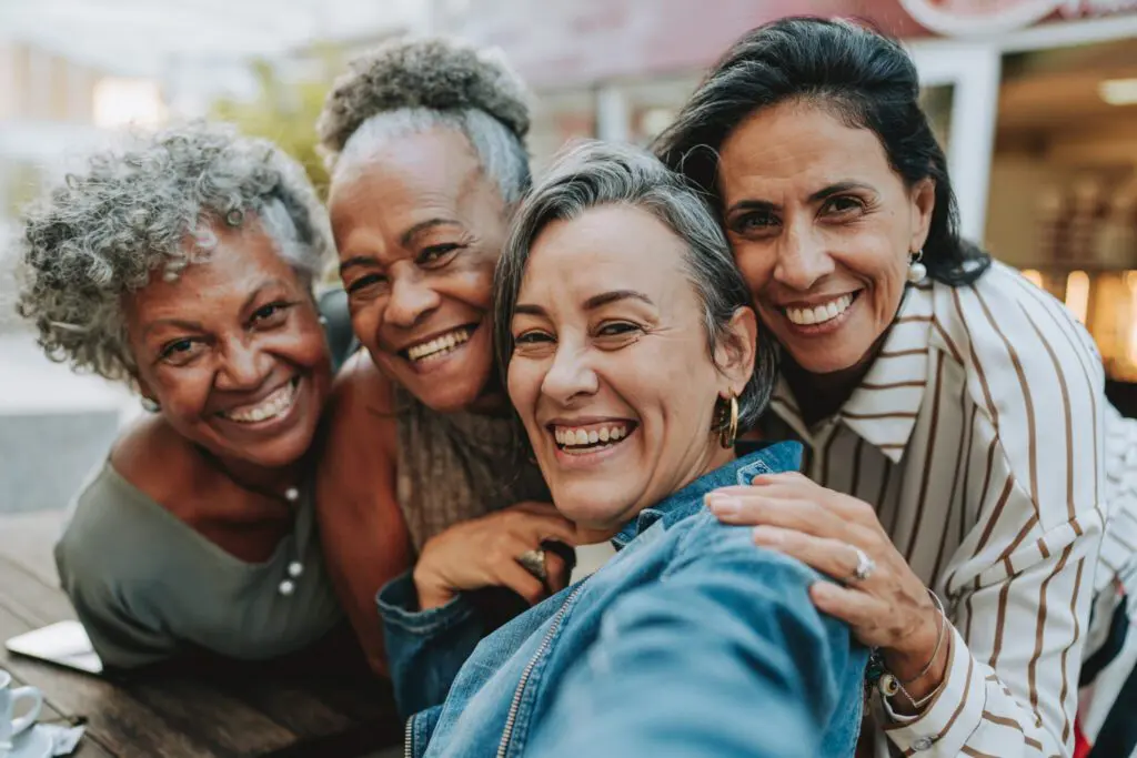 Group of diverse senior women smiling