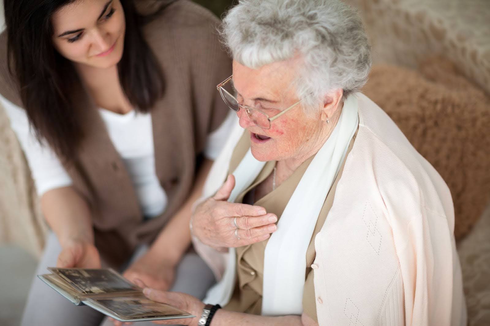Senior woman looking at photo album