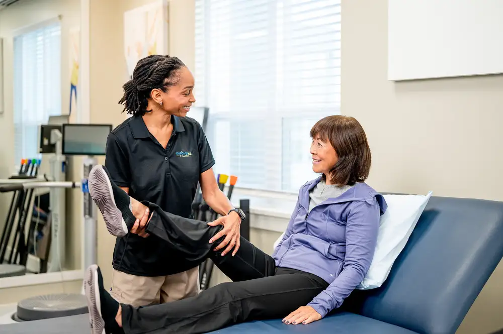a Clarendale Clayton resident working with their physical trainer